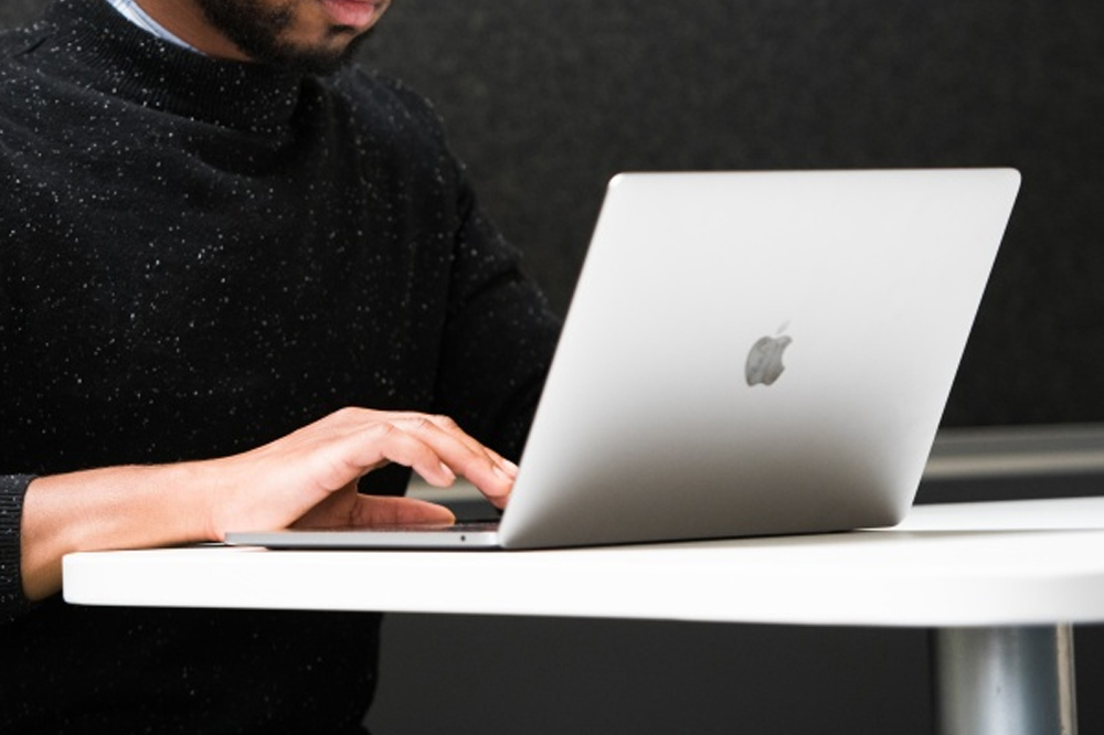 A student studying on their laptop